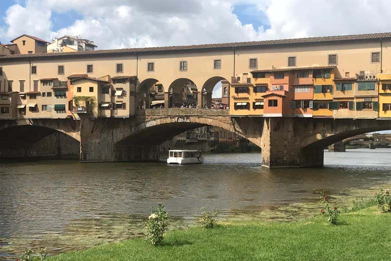 Pass under the legendary Ponte Vecchio
